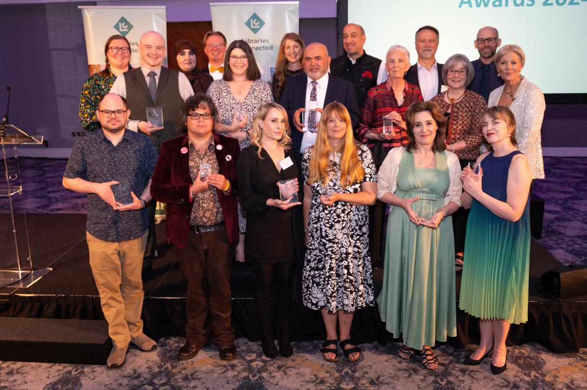 Libraries Connected Award winners pose with their trophies.