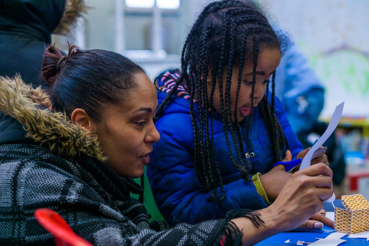 Mother and daughter in a library