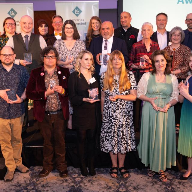 Libraries Connected Award winners pose with their trophies.