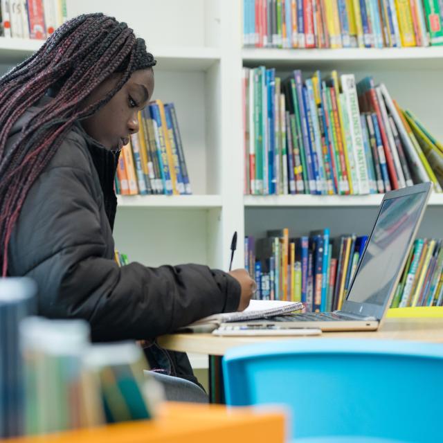 Girl studying in a library